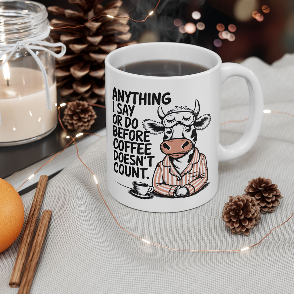 Funny Cow Coffee Mug — "Anything I Say or Do Before Coffee Doesn’t Count" Ceramic Mug (11oz/15oz)