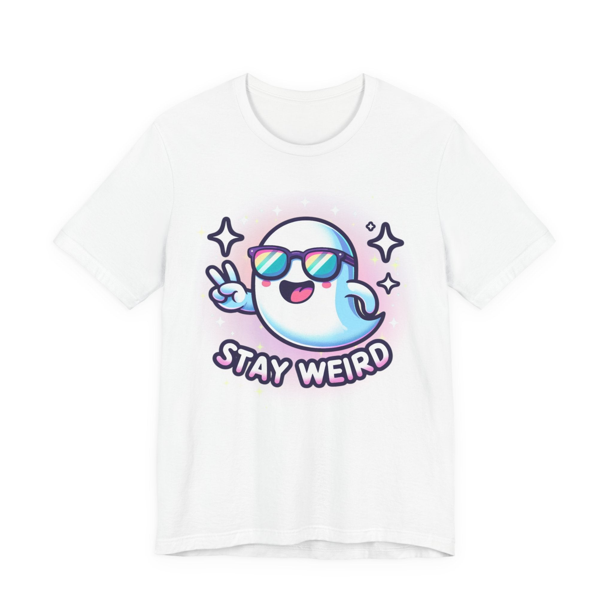 A white short-sleeve crewneck t-shirt featuring a cartoon graphic of a blue and white ghost wearing pink sunglasses and making a peace sign, with the text 'STAY WEIRD' underneath.
