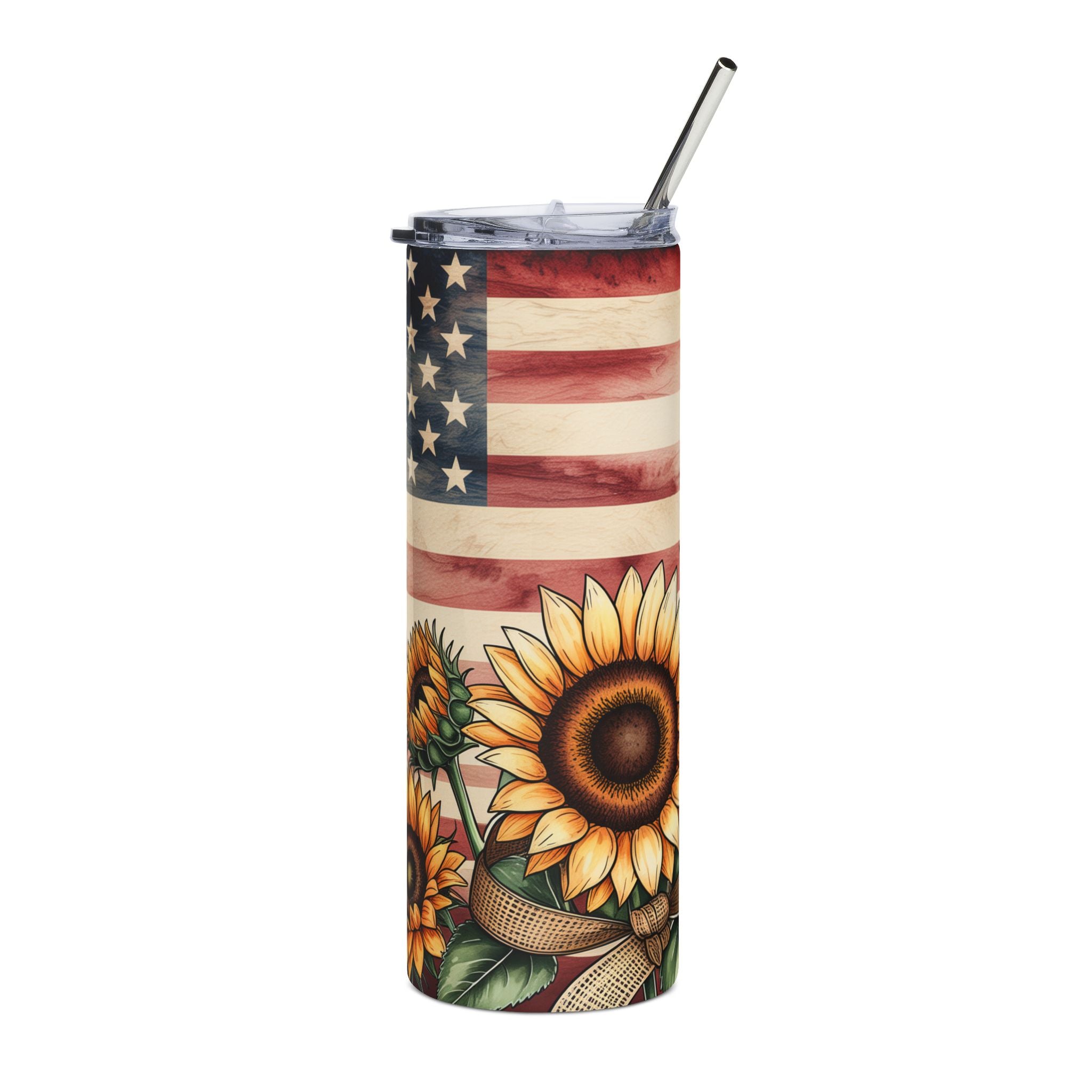 A tall insulated tumbler with a clear lid and metal straw, featuring a rustic American flag and sunflower print on a white background.