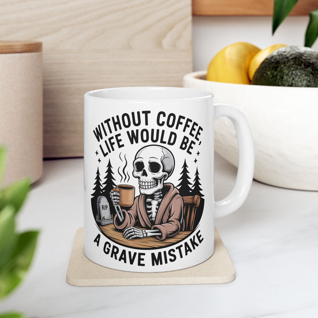White mug with skeleton design and coffee-themed text on a coaster, surrounded by plants and kitchen items.