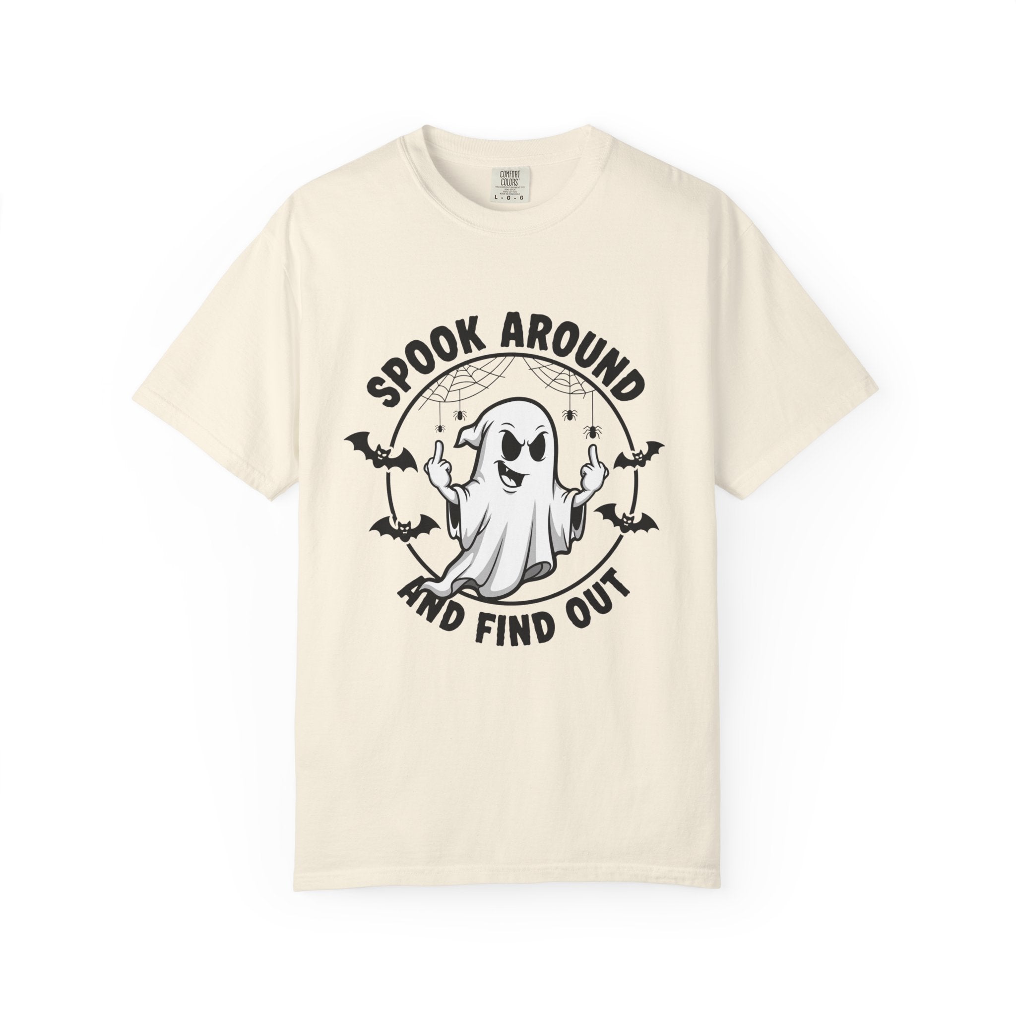 An off-white short-sleeve crewneck t-shirt featuring a black graphic of a cartoon ghost surrounded by bats and the text 'SPOOK AROUND AND FIND OUT'.