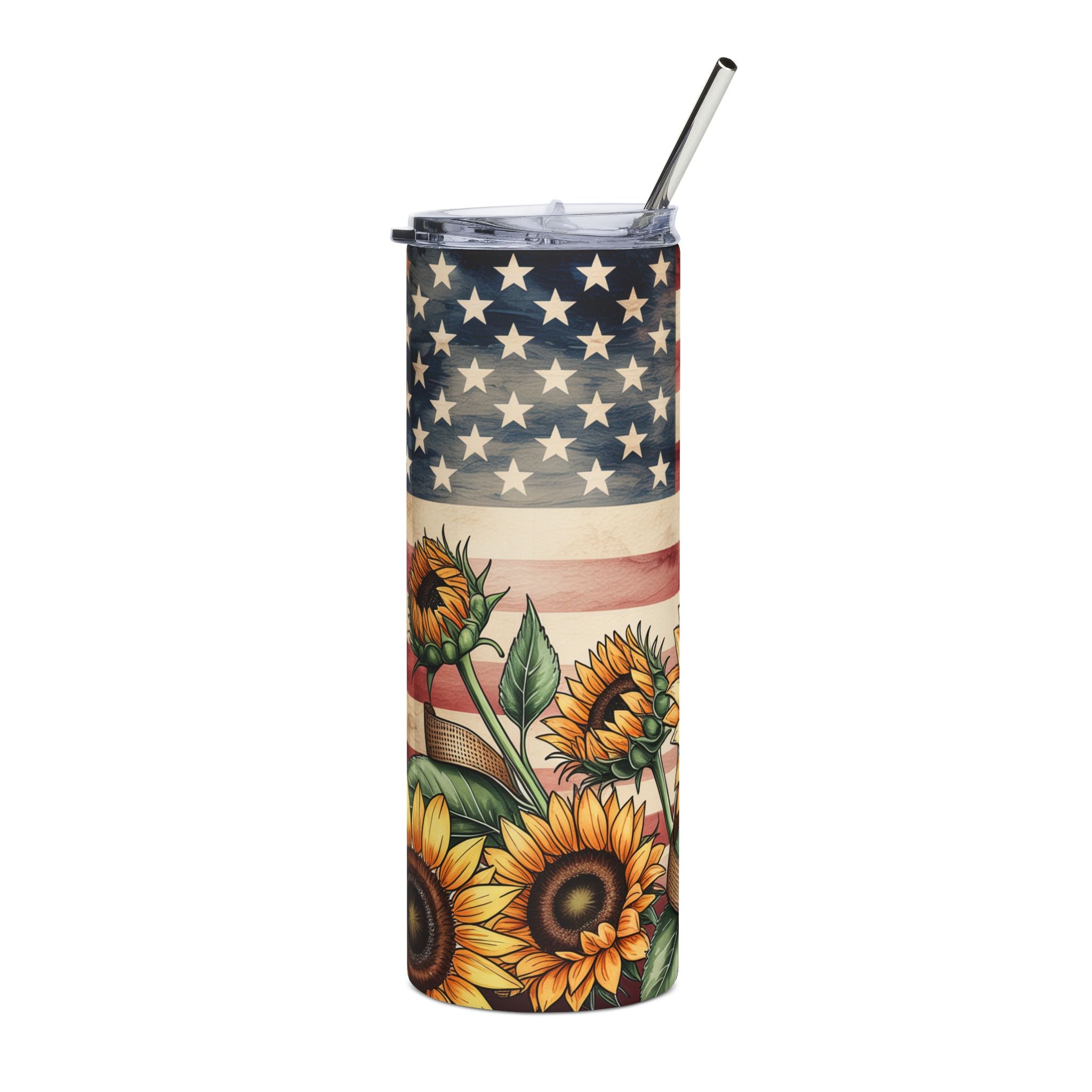 A tall insulated tumbler with a clear lid and metal straw, featuring a printed design of the American flag above large yellow sunflowers with green leaves on a white background.