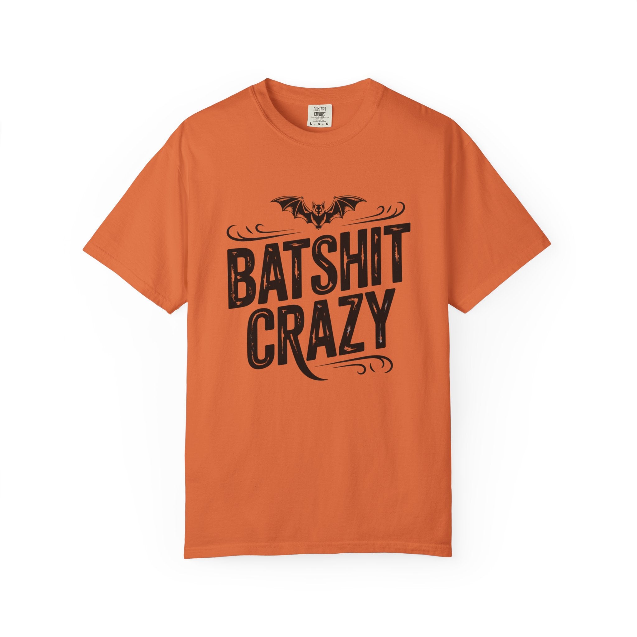 An orange short-sleeve crewneck t-shirt featuring a black graphic print of a bat above the words 'BATSHIT CRAZY' in a stylized font, displayed on a clean white background.