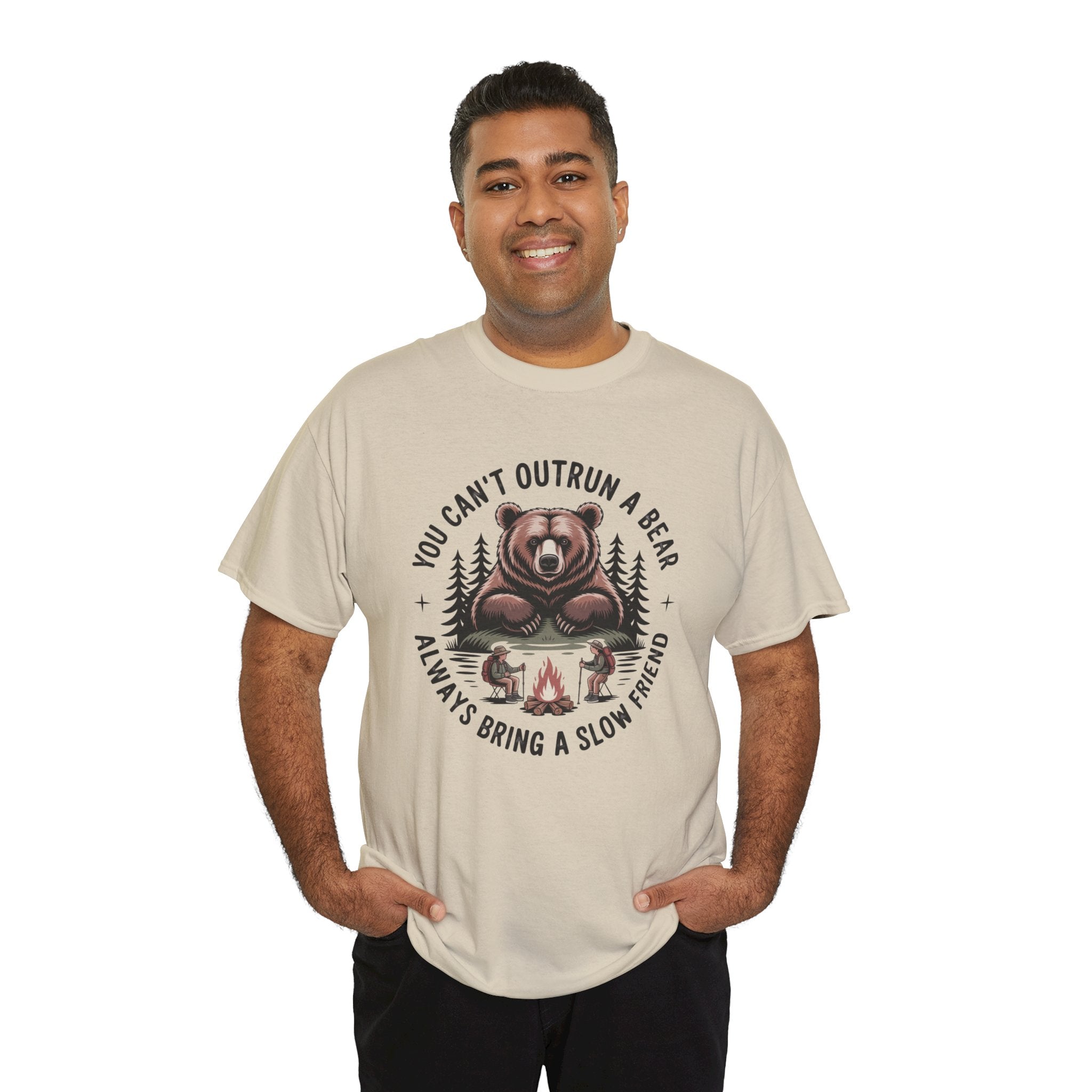 Man wearing a beige t-shirt with a bear graphic and text on a white background