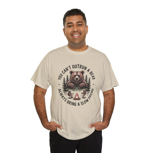 Man wearing a beige t-shirt with a bear graphic and text on a white background
