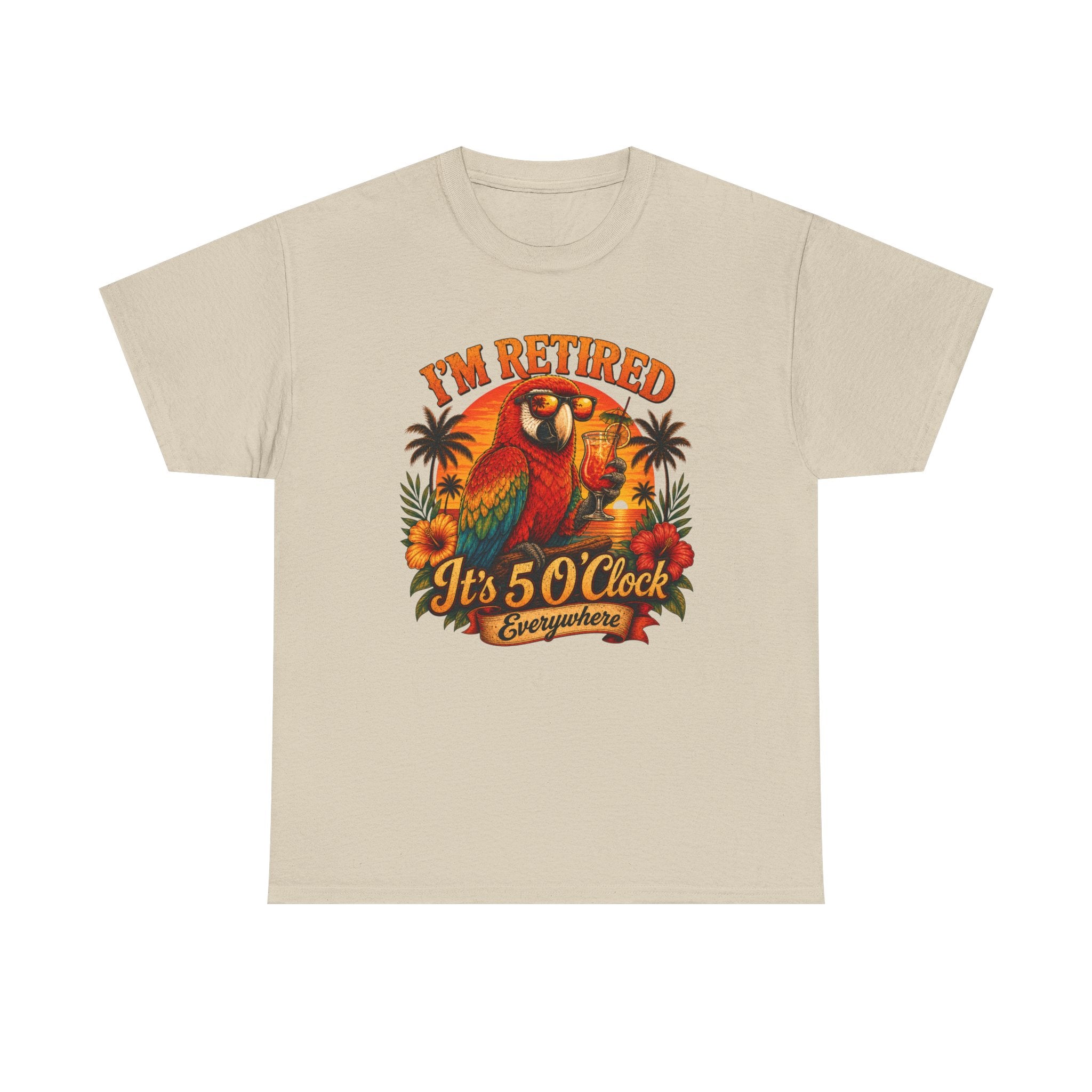 A light beige crewneck t-shirt featuring a colorful graphic print of a parrot, palm trees, and the text 'I'M RETIRED It's 5 O'clock Everywhere' on a solid white background.