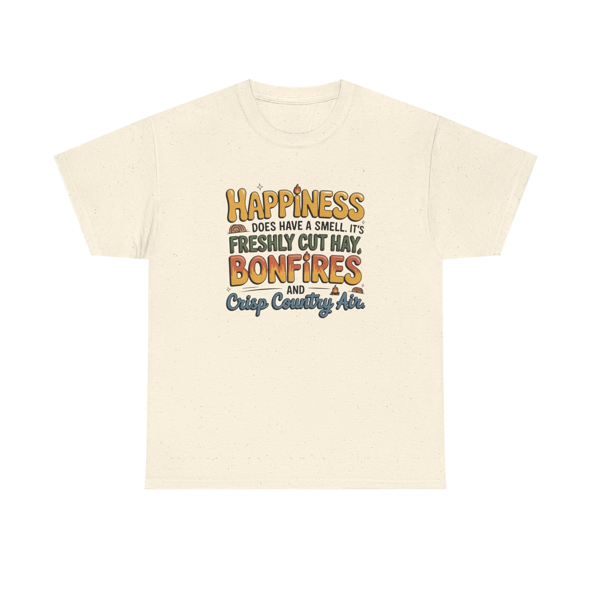 An off-white short-sleeve t-shirt with a rustic graphic print on the front. The text reads 'HAPPINESS DOES HAVE A SMELL, IT'S FRESHLY CUT HAY, BONFIRES AND Crisp Country Air' in a warm, distressed font.