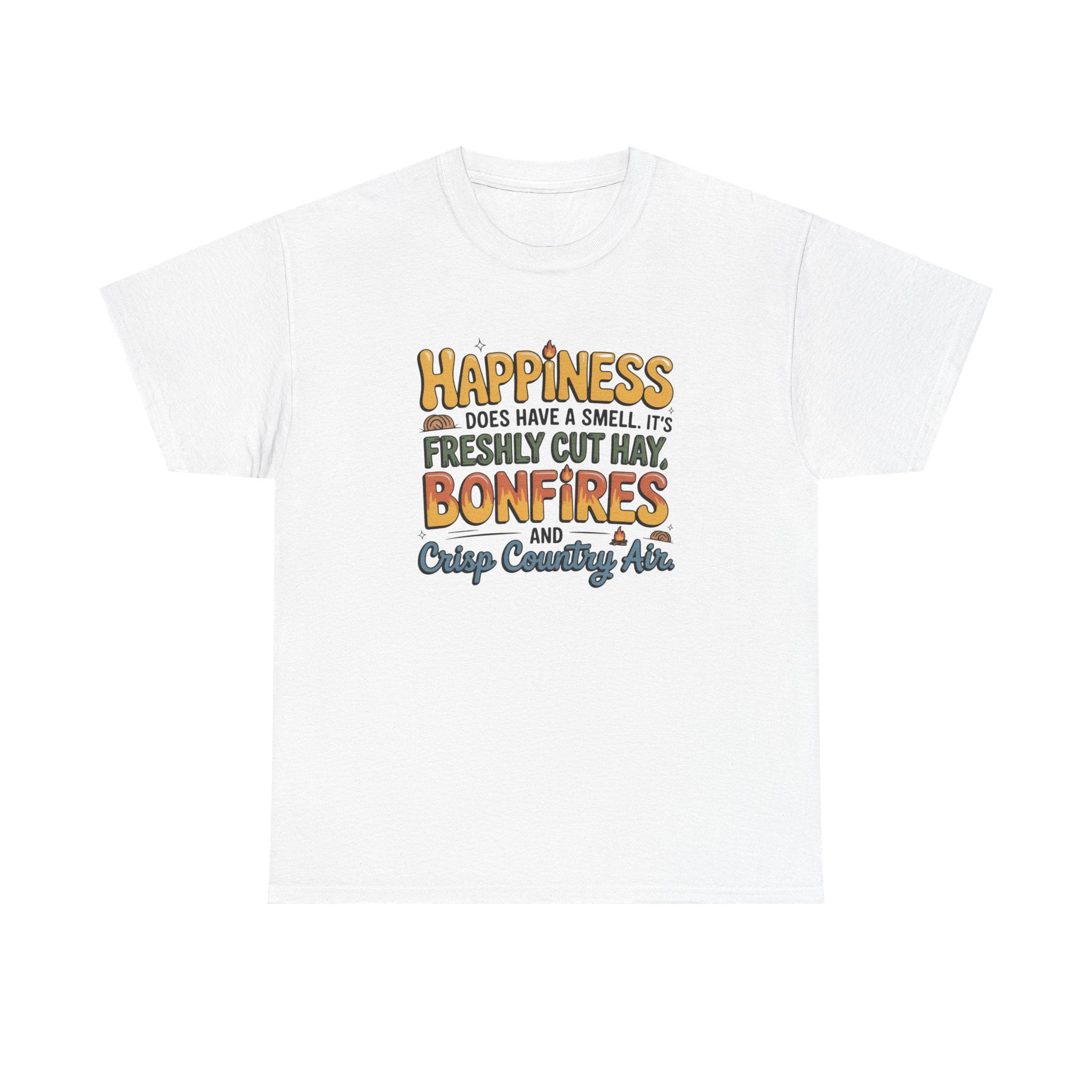 A white short-sleeve crewneck t-shirt with a colorful graphic text print on the chest that reads 'HAPPINESS DOES HAVE A SMELL, IT'S FRESHLY CUT HAY, BONFIRES AND Crisp Country Air.'.