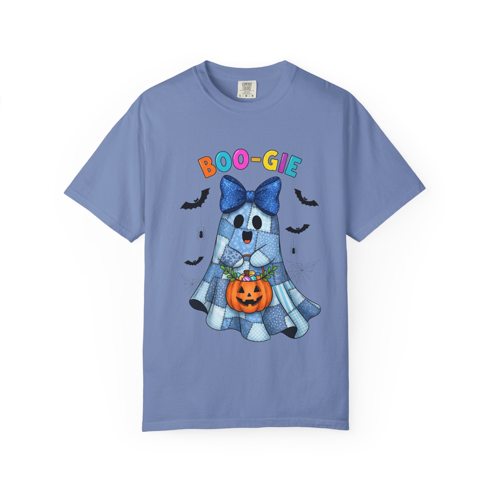 A light blue short-sleeve crewneck t-shirt featuring a cartoon graphic of a ghost in a plaid Halloween costume holding a jack-o'-lantern, with the text 'BOO-GIE' above it and small black bats flying around, shown on a plain white background.