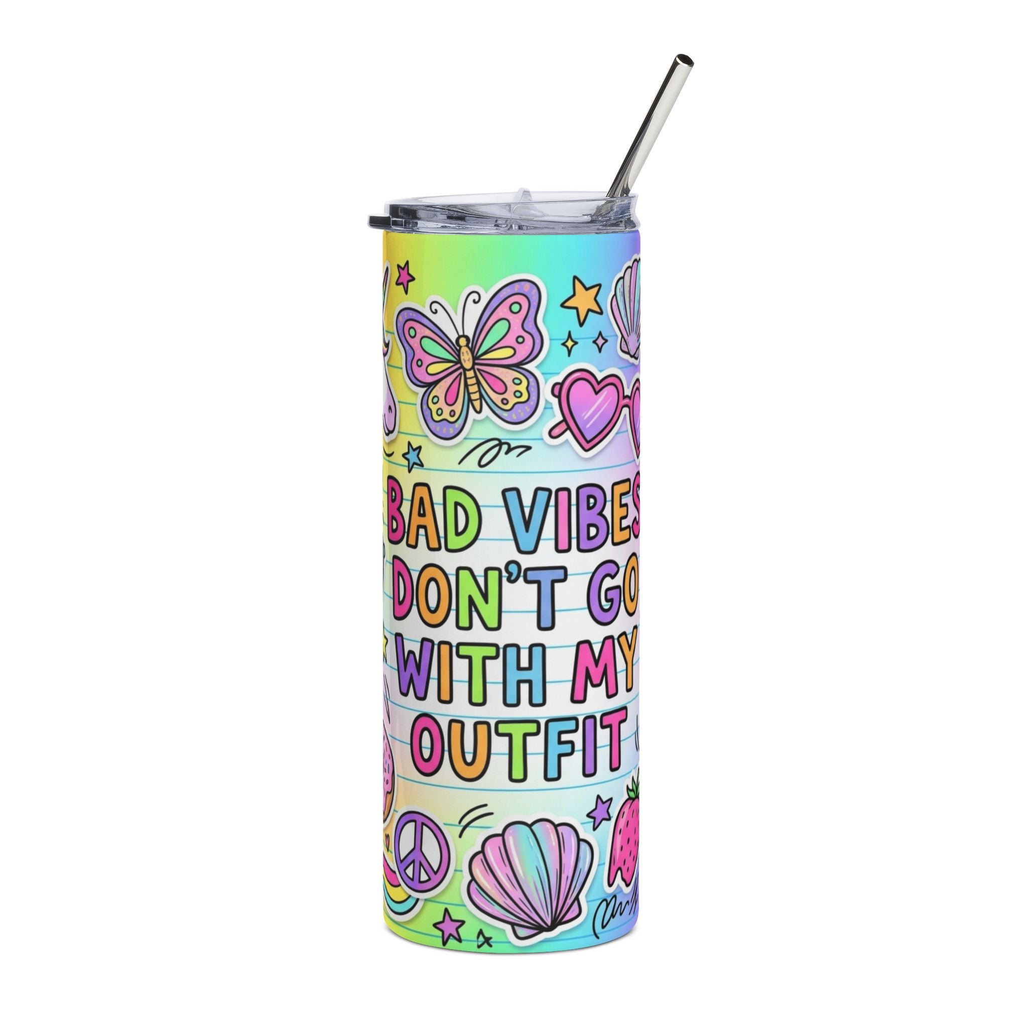 A tall, skinny stainless steel tumbler with a clear lid and metal straw, decorated with a colorful pastel rainbow gradient, a pink butterfly, pink hearts, seashells, peace signs, and the text 'BAD VIBES DON'T GO WITH MY OUTFIT' in rainbow letters.