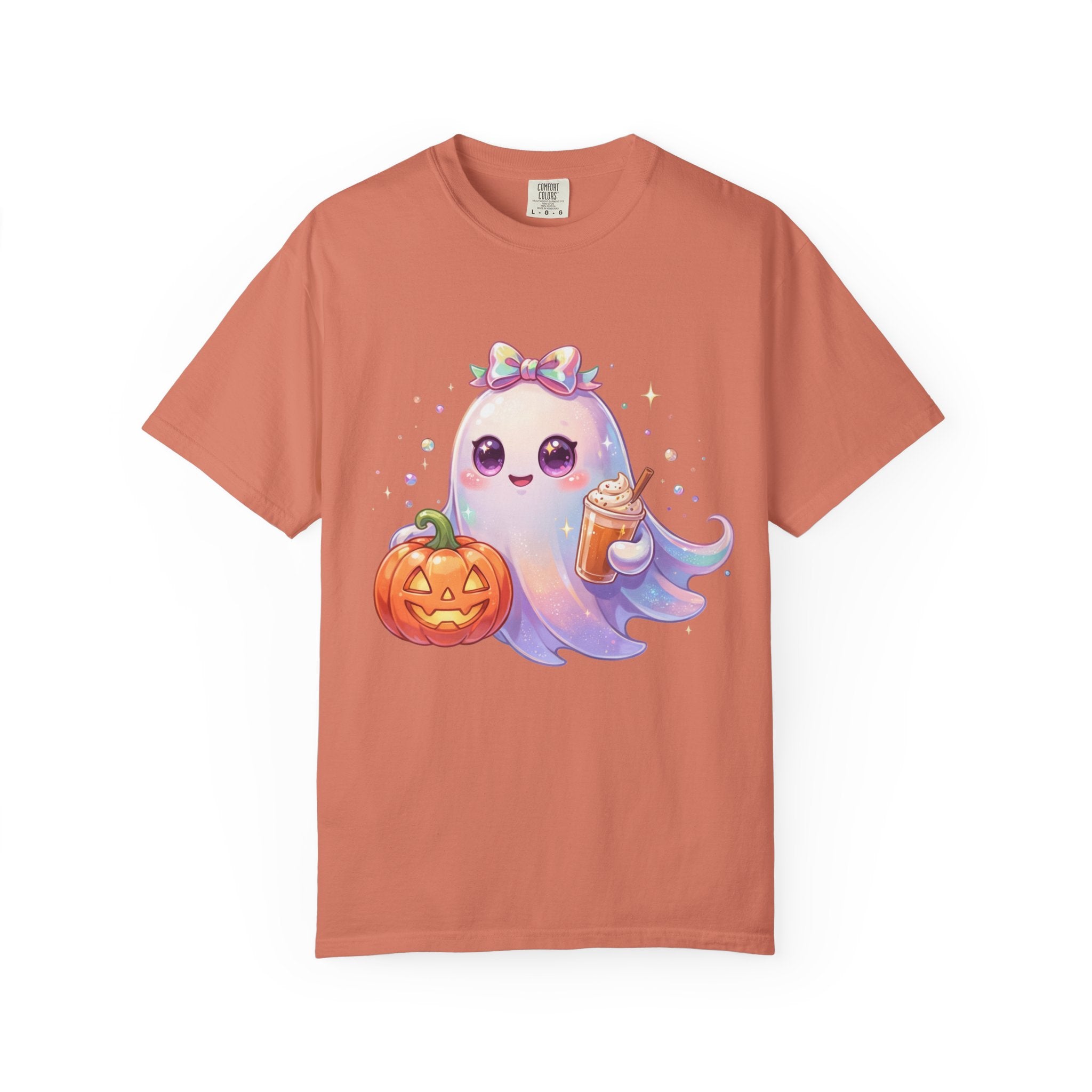 A peach-colored short-sleeve t-shirt featuring a cute cartoon graphic of a smiling ghost holding a jack-o'-lantern and a drink, set against a plain white background.