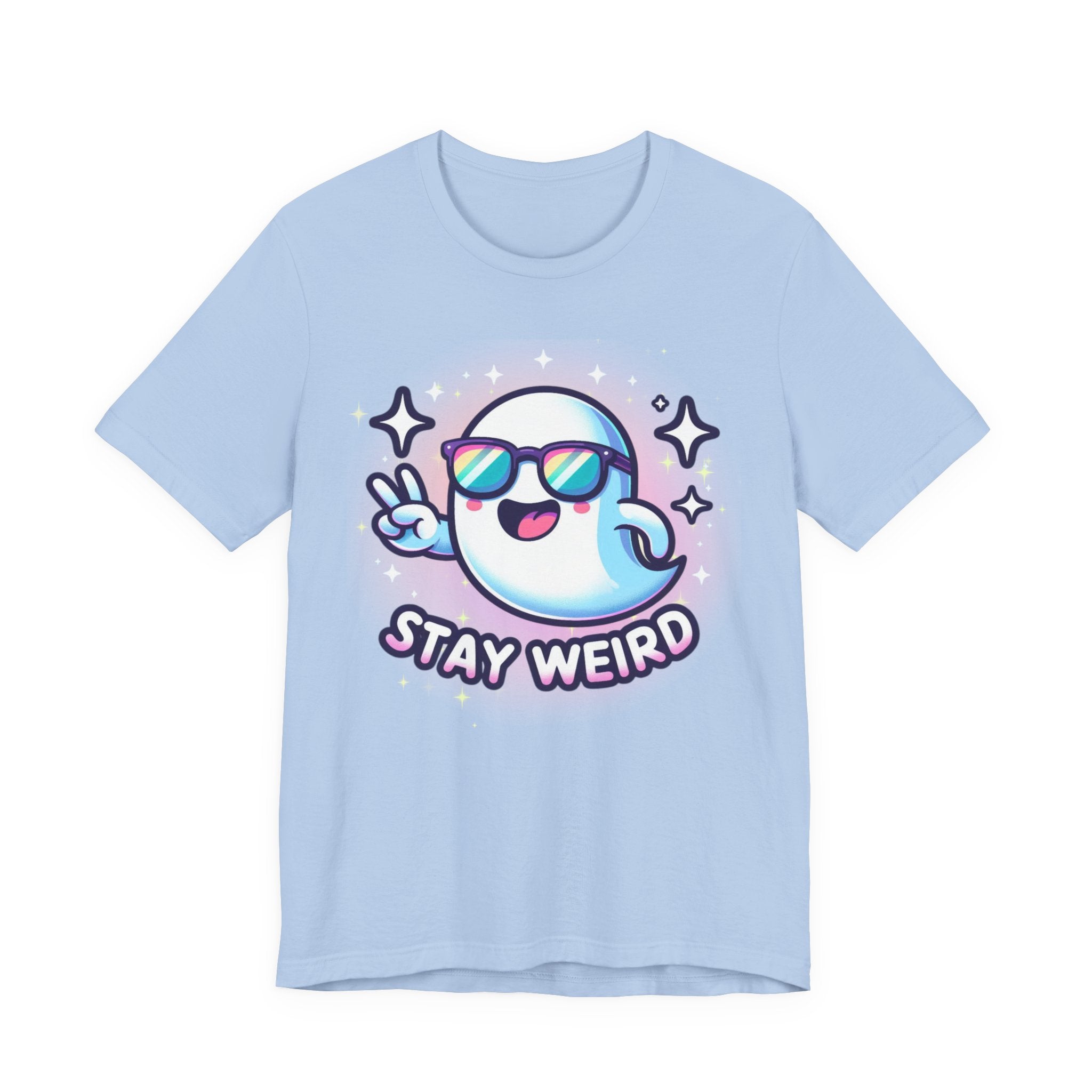 A light blue short-sleeve t-shirt with a cartoon graphic of a ghost wearing sunglasses and making a peace sign, with the text 'STAY WEIRD' below it, on a solid white background.