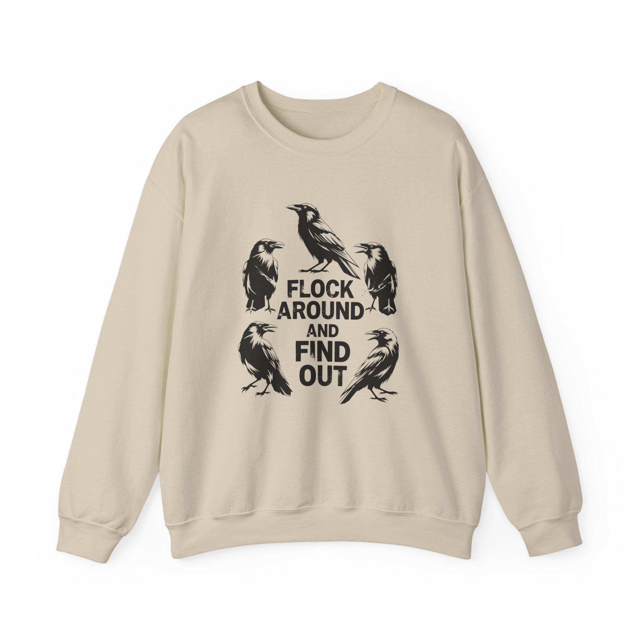 A beige crewneck sweatshirt featuring a black graphic print of six crows arranged around the text 'FLOCK AROUND AND FIND OUT' on the front, displayed against a solid white background.