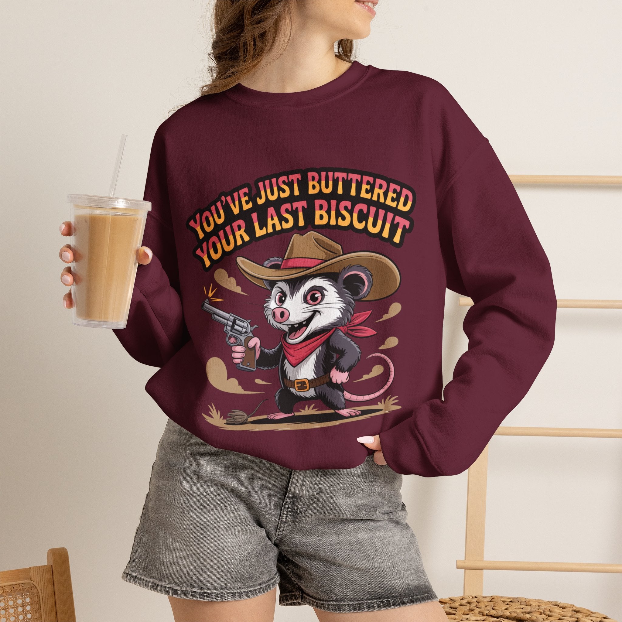 Crewneck Sweatshirt – "You’ve Just Buttered Your Last Biscuit" Cowboy Opossum Graphic