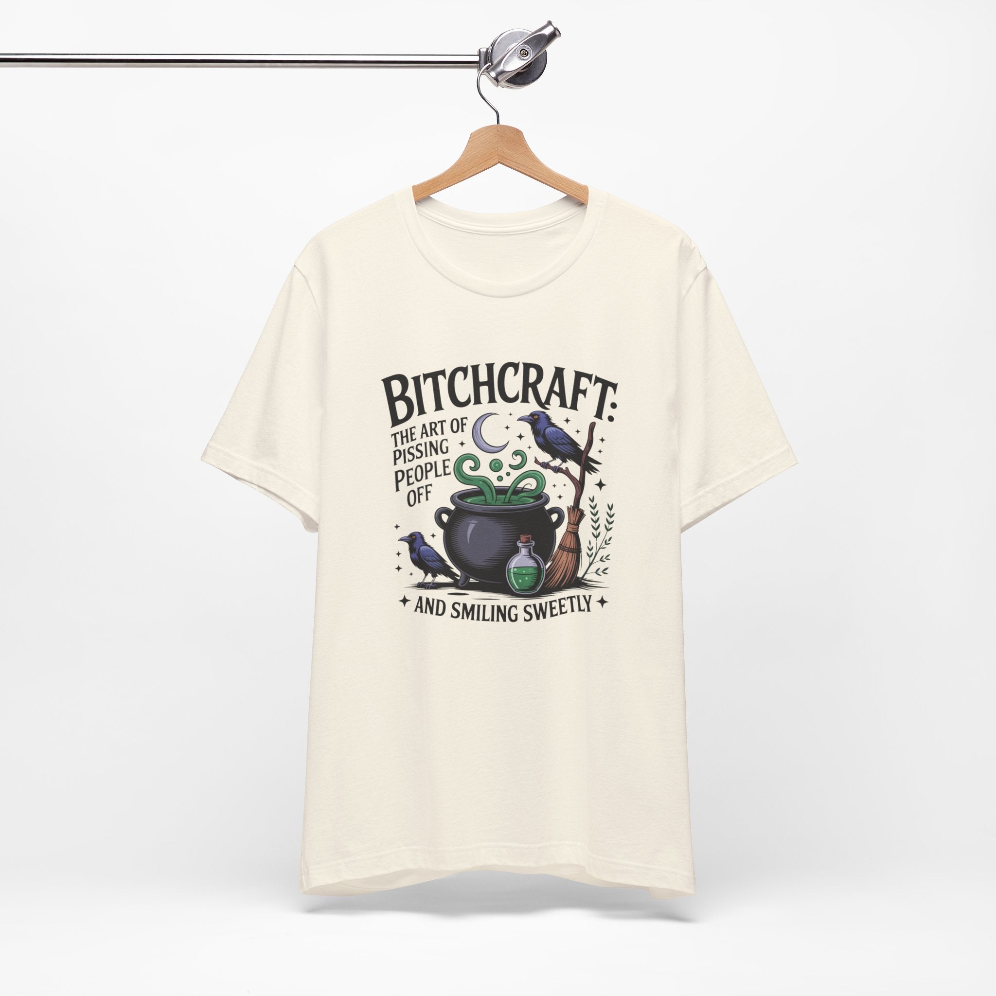 Bitchcraft Tee — "The Art of Pissing People Off and Smiling Sweetly" Witchy Graphic T‑Shirt