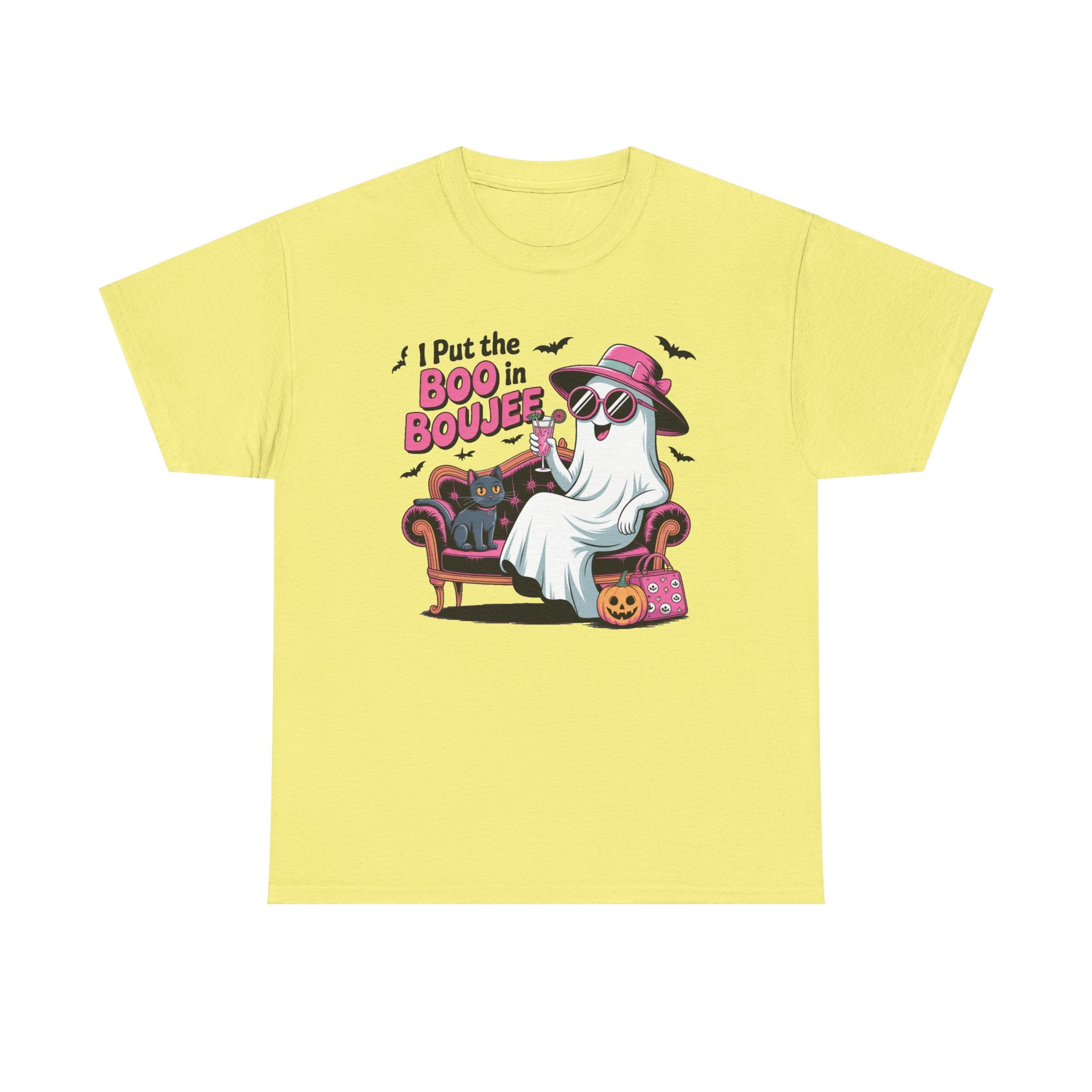 A pale yellow short-sleeve crewneck t-shirt featuring a colorful graphic of a ghost in a pink hat sitting on a purple armchair with the text 'I Put the BOO in BOJEE' and small bats.