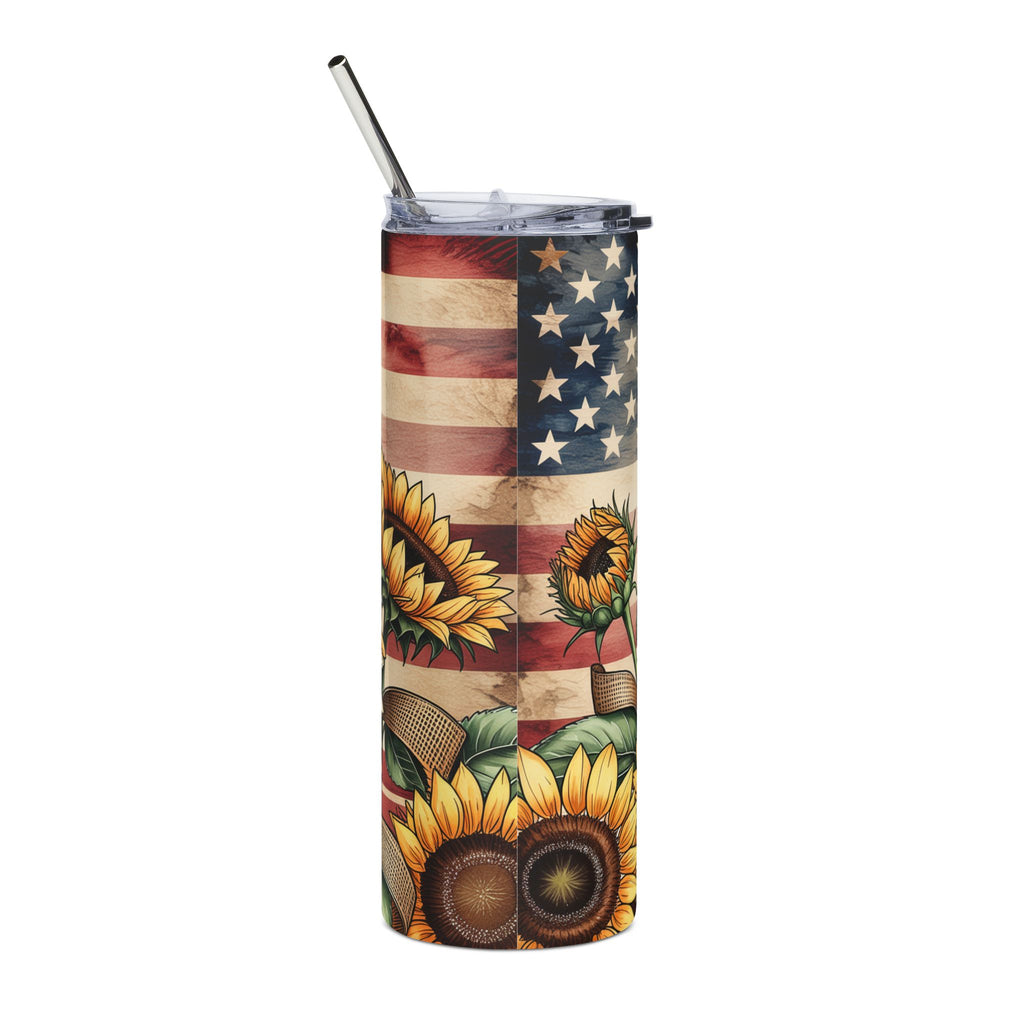A tall insulated tumbler with a clear lid and metal straw, featuring a vintage-style American flag and sunflower print on a white background.