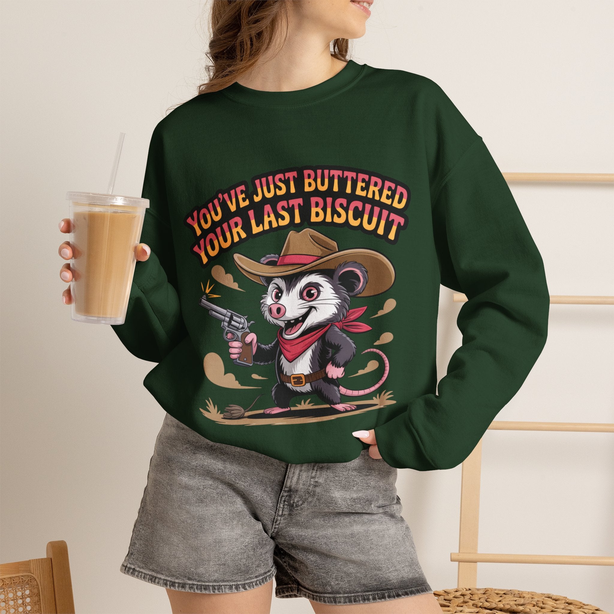 Crewneck Sweatshirt – "You’ve Just Buttered Your Last Biscuit" Cowboy Opossum Graphic